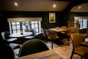 The Queens Great Corby upstairs seating area
